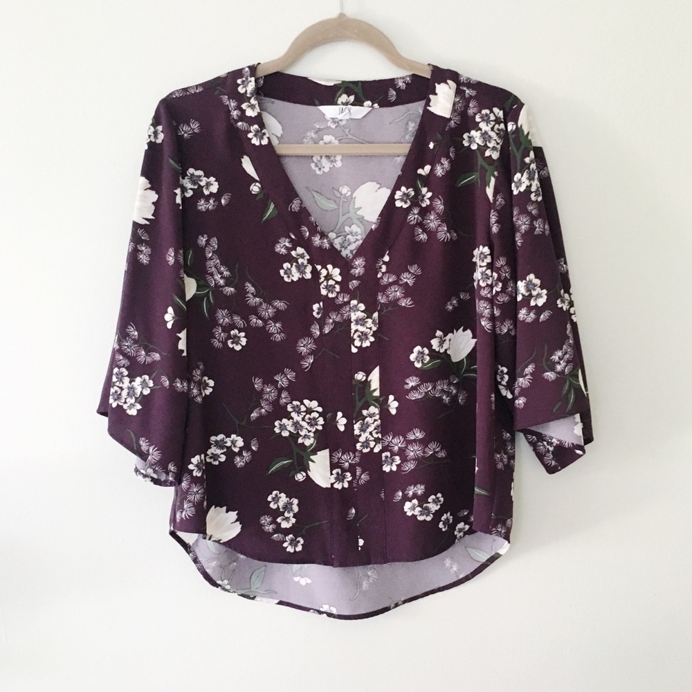 plum floral blouse